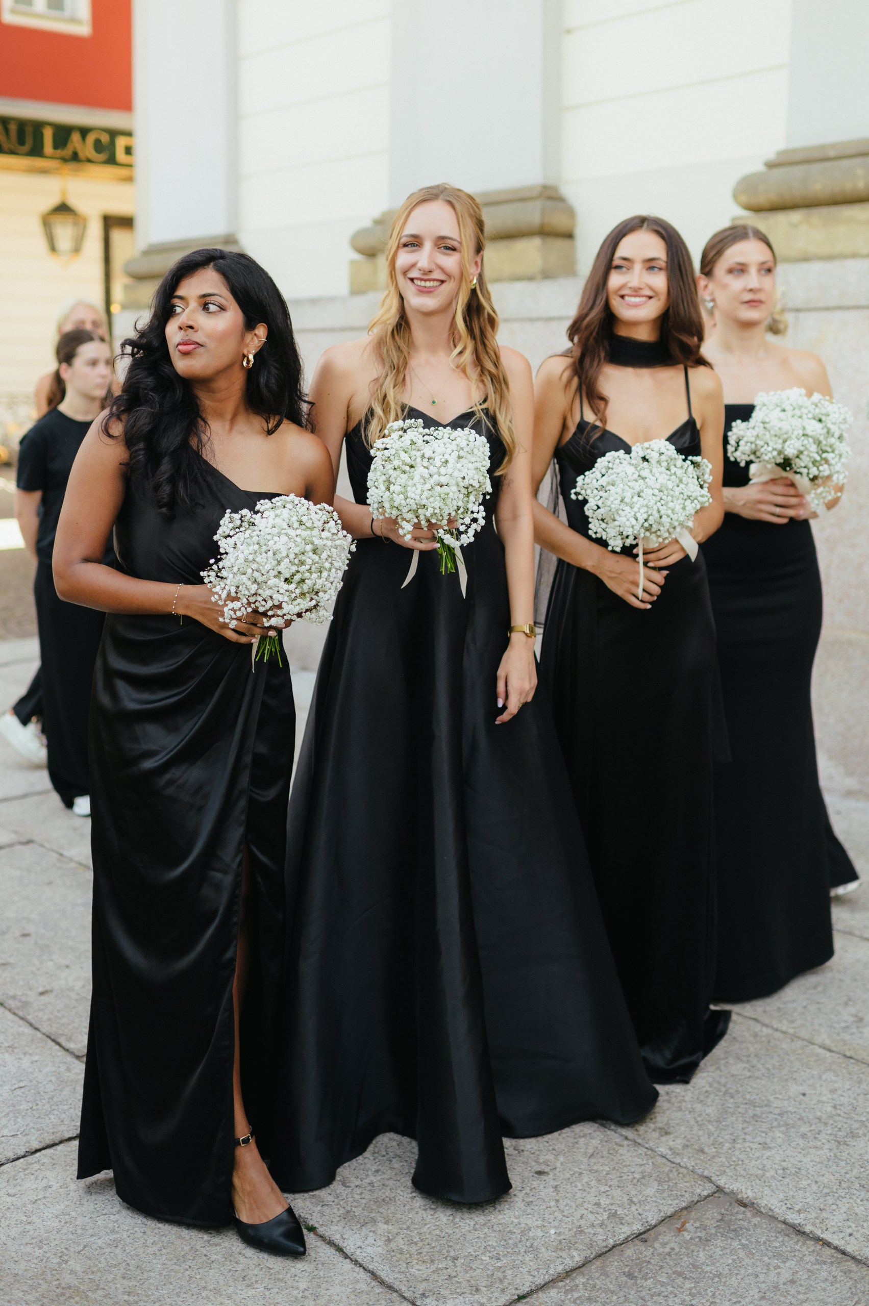 Bridesmaids at a Lake Maggiore Wedding | Andrea & Max Bridesmaids outside the Church of Saints Ambrogio and Theodulo in Stresa during a wedding on Lake Maggiore, Italy.