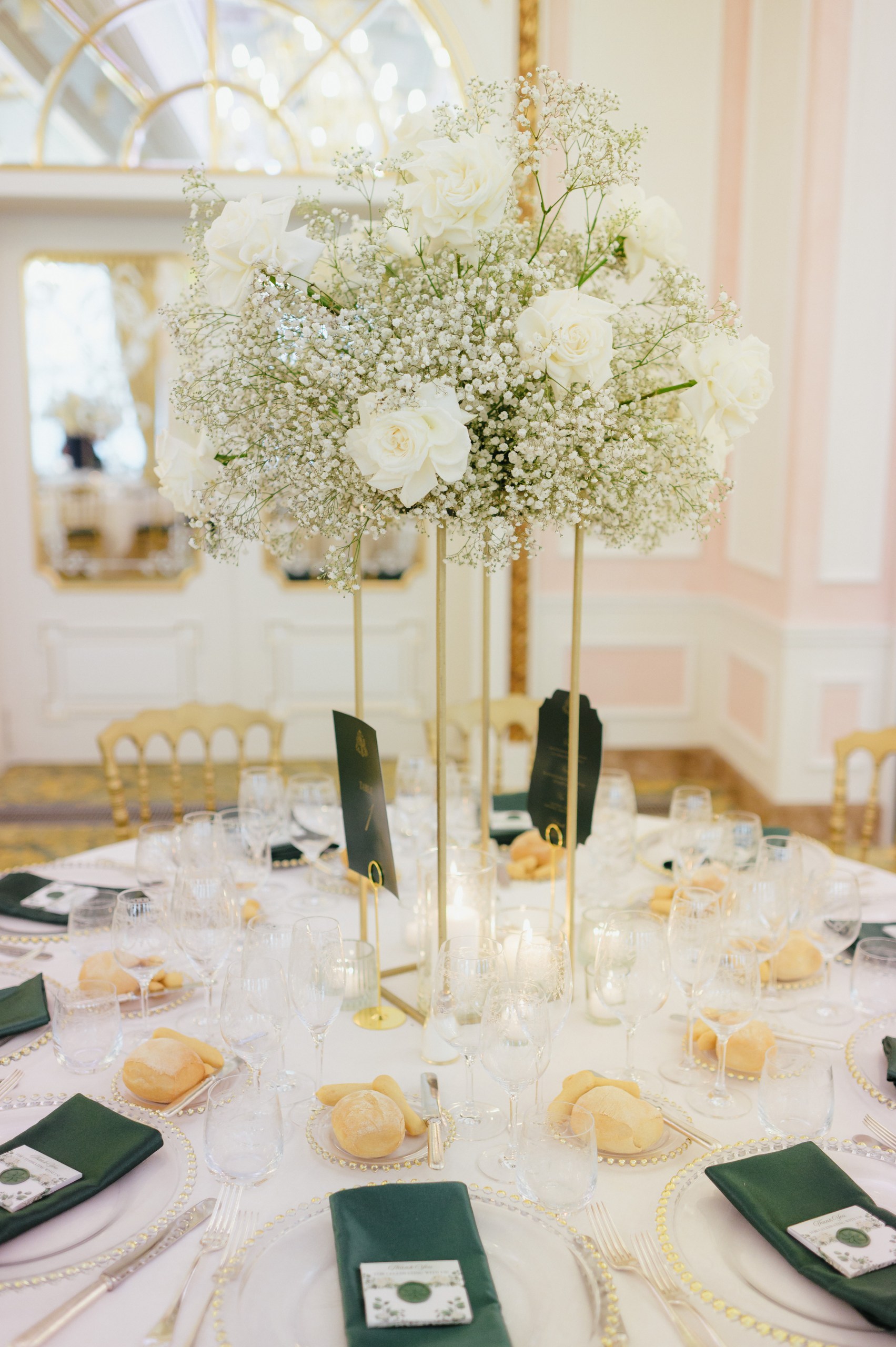 Luxury Wedding Table Decoration – Lake Maggiore Elegant wedding table with white floral centrepiece, gold chairs and candlelight at Grand Hotel des Iles Borromées.