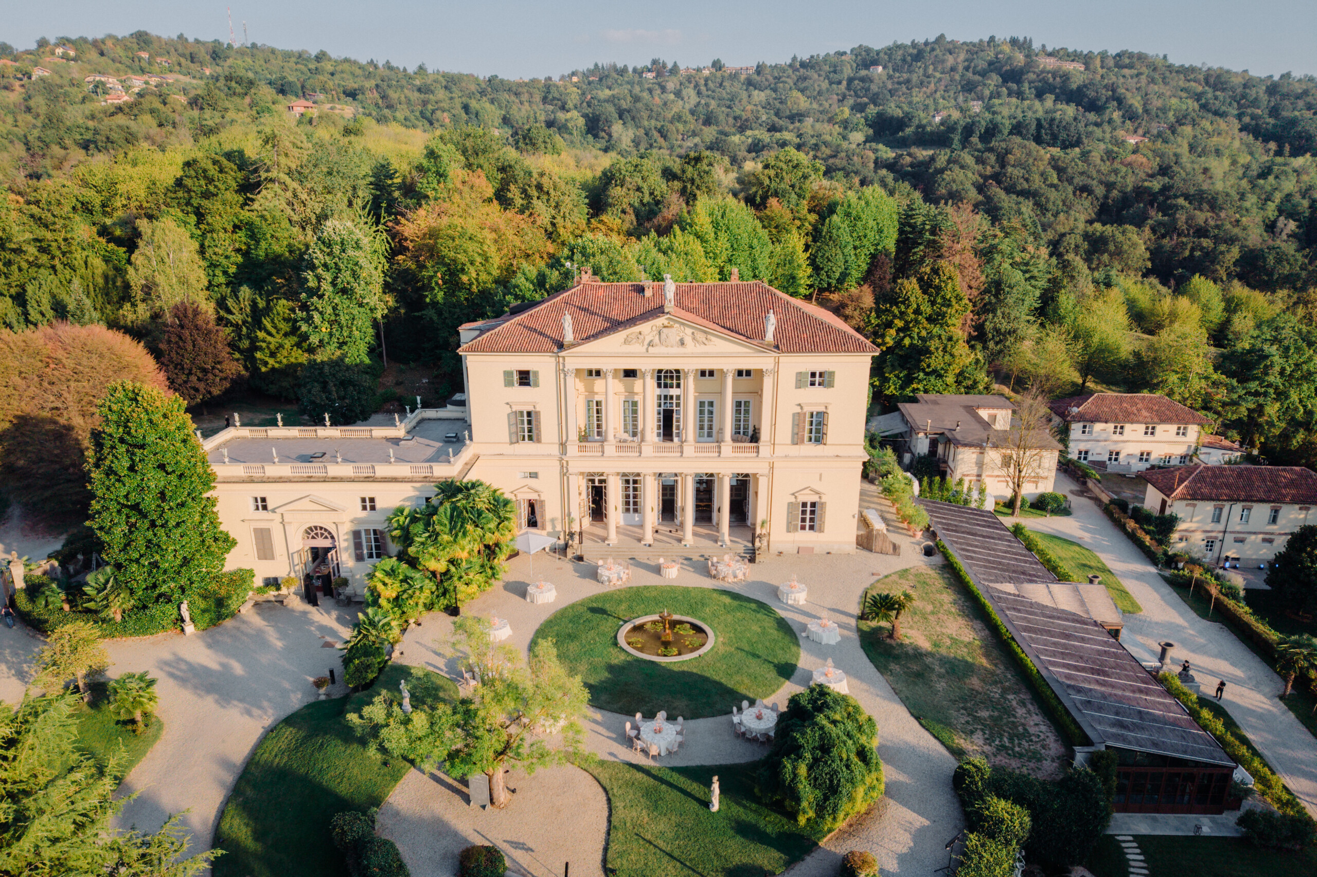 Outdoor Wedding Ceremony at Villa Cimena – Turin Aerial view of Giannella and Enrico's outdoor wedding ceremony in the gardens of Villa Cimena in Turin, Italy.